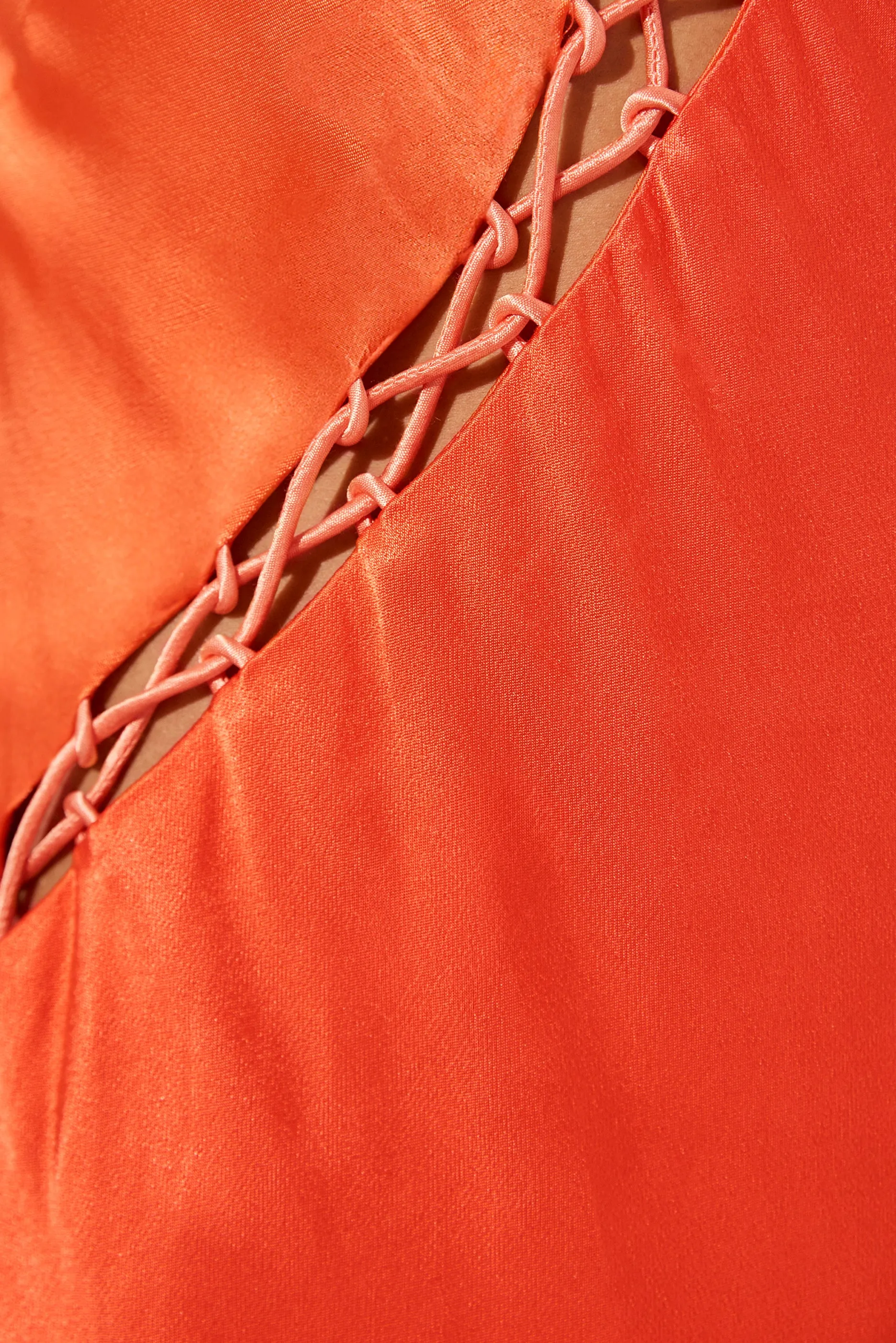 Sure, here is an optimized title for the product:

Vibrant Red Orange Lace-Up Mini Dress - Hibiscus Collection