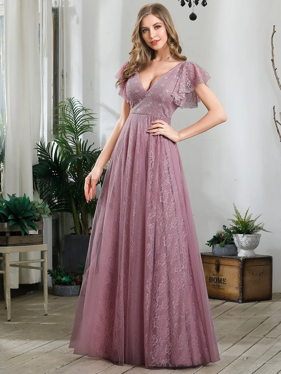 Robe de marie longue en dentelle avec manches  volants et col V double